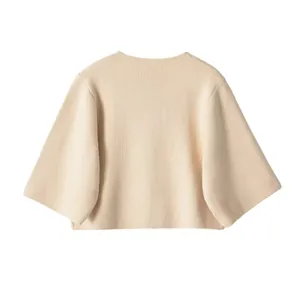Vue arrière d'un cardigan court en tricot beige à col rond pour femme élégant