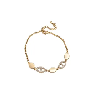 Elegant gold-plated bracelet featuring micro-pave zircon oval charms for women's jewelry.