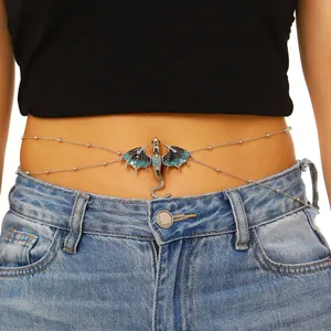 Detailed close-up of a vintage dragon body chain featuring colorful enamel wings on a model