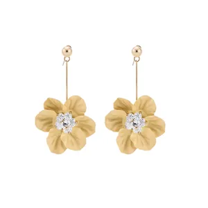 Elegant matte gold flower drop earrings with a sparkling crystal center for summer