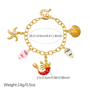 Detailed view of gold ocean charm bracelet with starfish and shrimp pendants for women.