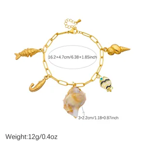 Gold plated stainless steel ocean charm bracelet with shell and fish size details