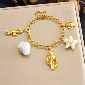 Gold-plated stainless steel ocean series charm bracelet with beach theme pendants