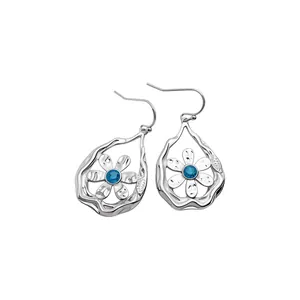 Exquisite silver floral waterdrop hook earrings featuring a central blue crystal stone