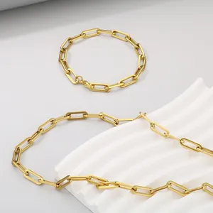 Conjunto de collar y pulsera minimalista de acero inoxidable dorado con cadena de clip