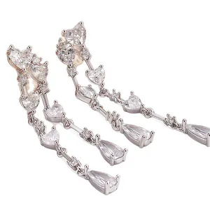 Silver heart tassel drop earrings with sparkling cubic zirconia for an elegant look.