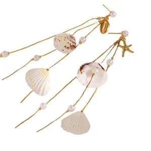 Detailed view of summer beach shell tassel earrings with imitation pearls decor