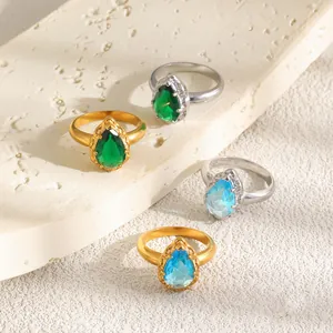 Anillos de acero inoxidable chapados en oro 18K con circón en forma de gota azul