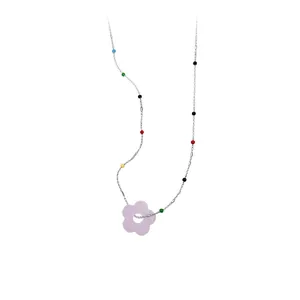 Elegant silver-toned chain necklace featuring colorful beads and a cute lavender flower pendant