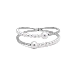 Elegant silver open bangle featuring gradient pearls and shimmering crystal accents.
