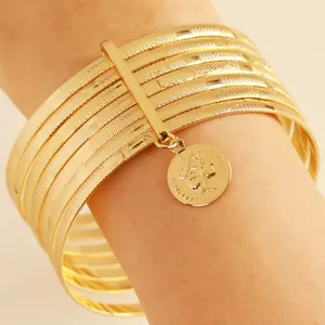 Vintage gold-layered bangle set with coin charm for women, 10-piece fashion jewelry