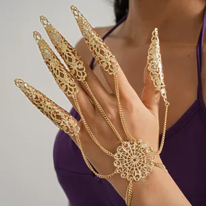 Detailed view of golden hollow double-layer claw ring bracelet with intricate filigree.