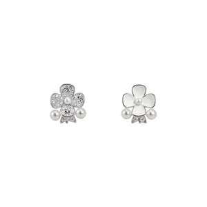 Elegant asymmetrical floral pearl earrings with silver needles and cubic zirconia crystals