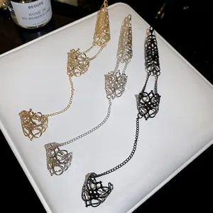 Gothic metalen vingerarmband met holle kegelvormige nagelringen in goud zilver zwart