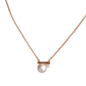 Elegant French style minimalist gold chain necklace featuring a pearl and rhinestone pendant