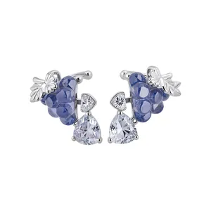 Elegant grape-shaped ear cuffs with purple stones and clear teardrop zircons on white