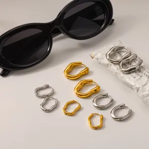 Minimalist irregular wrinkled stainless steel hoop earrings in gold and silver colors