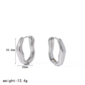 Elegant minimalist silver irregular wavy textured stainless steel hoop earrings for women