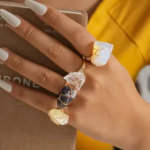 Unique natural raw crystal wire wrapped rings set with amethyst and opal stones