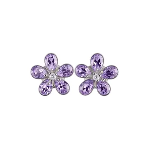 Elegant silver stud earrings featuring purple crystal flower design with center diamond.