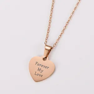 Close-up view of a rose gold heart pendant featuring a "Forever My Love" cursive engraving.