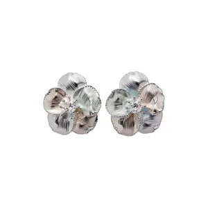 Elegant flower-shaped stud earrings featuring sparkling zircon and textured petals