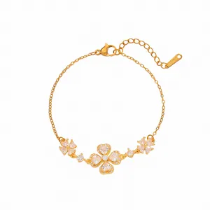 Bracelet trèfle fleurs de cerisier plaqué or élégant avec cristaux étincelants