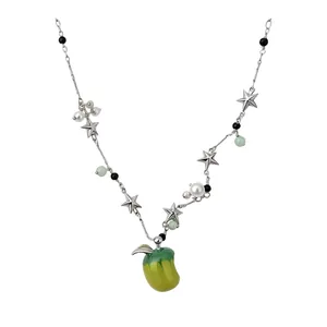 Sweet star and pearl choker necklace featuring a green enamel apple pendant design