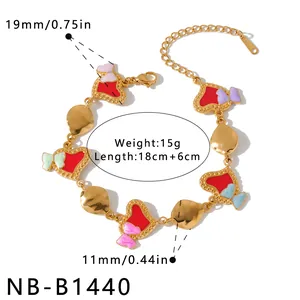 Bracciale in acciaio dorato con cuore e fiocco con misure dettagliate di dimensioni e peso