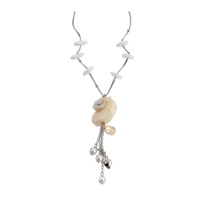 Elegant conch pendant necklace with pearls and heart charms for beach vacations