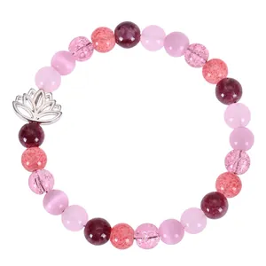 Handmade pink crystal beaded bracelet with silver lotus charm, strawberry quartz style for women