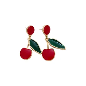 Elegant vintage gold-toned enamel cherry drop earrings for women on white background
