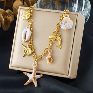 Gold-plated marine life necklace with starfish and shell charms, beach style variant