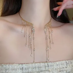 Angel wings inspired gold choker necklace with sparkling crystal tassels for women