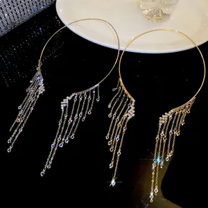 Close-up of sparkling crystal tassel choker with elegant gold-tone fringe detail