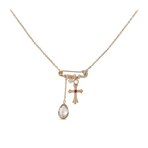 18k rose gold plated necklace with safety pin, cross and teardrop charms