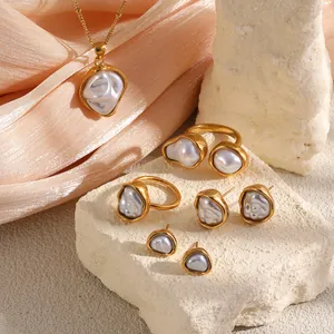 Detailed view of irregular baroque pearls on gold-plated stainless steel jewelry
