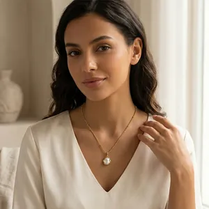 Elegant model wearing a French retro irregular pearl necklace in gold plating