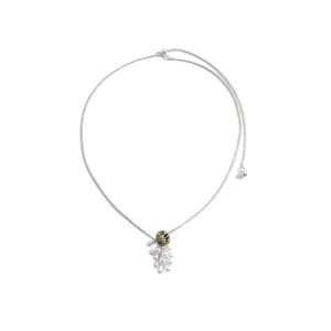 Elegant minimalist silver choker featuring a spotted stone and water-drop pearl cluster pendant