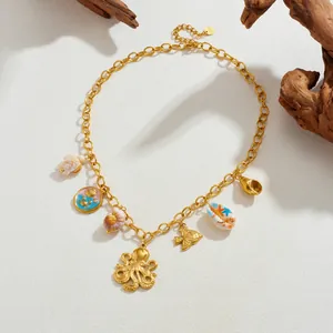 Gold-plated stainless steel necklace with various marine life charms like octopus and shell