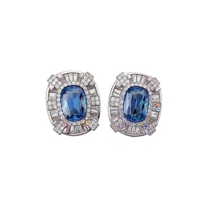 Vintage palace style oval stud earrings with blue center stone and sparkling crystals.