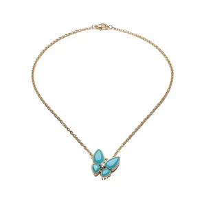 Elegant gold-plated butterfly pendant necklace featuring turquoise wings and a zircon center