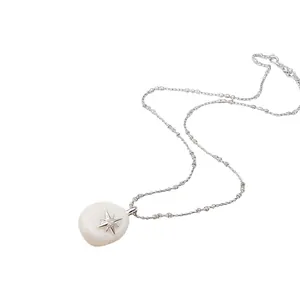 Elegant French style necklace with white pebble pendant and silver star detail