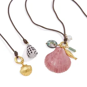 Ocean themed shell long necklace set in gold titanium steel with natural pearls and charms