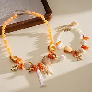 Parure de bijoux de plage d'été avec perles de cristal orange et coquillages