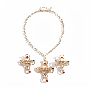 Vintage style gold-toned metal lips cross pendant necklace and matching stud earrings set