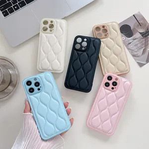Close-up of quilted leather iPhone case texture and various color options in lifestyle setting