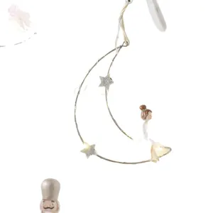 Festive LED lighted Christmas hanging decoration with crescent moon star and resin fairy