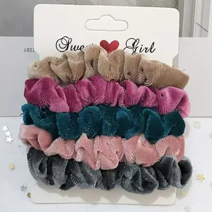 Lot de cinq chouchous en velours doux aux couleurs unies assorties pour la coiffure chic