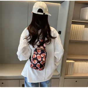 Detailed back view of a trendy women's nylon chest bag with American football print